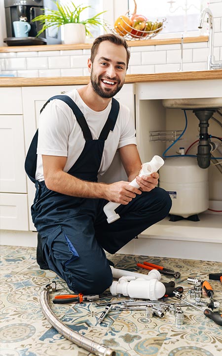 Photo of plumber at work